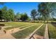 A park with horseshoe pits and a picnic area in the distance at 6000 W 29Th Ave, Denver, CO 80214