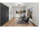 Bright sunroom with hardwood floors and comfortable seating at 535 Josephine St, Denver, CO 80206