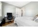 This bedroom features a neutral color scheme, two closets and space for a desk; perfect for work and rest at 4196 Chase St, Denver, CO 80212