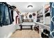 Spacious walk-in closet with built-in shelving and ample hanging space, perfect for organization and storage at 4196 Chase St, Denver, CO 80212