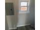 Hallway with a small window and light gray walls at 521 10Th St, Fort Lupton, CO 80621