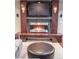 Basement with a modern fireplace, adding warmth and ambiance at 6588 S Sheridan Loop, Littleton, CO 80123