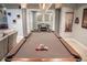 Finished basement with a pool table, offering entertainment for all ages at 6588 S Sheridan Loop, Littleton, CO 80123