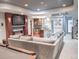 Finished basement with sectional sofa, wet bar, fireplace, and pool table at 6588 S Sheridan Loop, Littleton, CO 80123