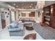 Spacious basement rec room featuring a large sectional sofa, a fireplace, and a pool table at 6588 S Sheridan Loop, Littleton, CO 80123