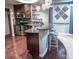 Basement wet bar with granite countertops, perfect for entertaining guests at 6588 S Sheridan Loop, Littleton, CO 80123