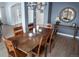 Formal dining room with hardwood floors and chandelier at 6588 S Sheridan Loop, Littleton, CO 80123