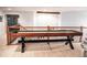 Upper level game room featuring a shuffleboard table at 6588 S Sheridan Loop, Littleton, CO 80123