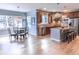 Kitchen features hardwood floors, granite counters, and stainless steel appliances at 6588 S Sheridan Loop, Littleton, CO 80123
