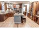 Modern kitchen with stainless steel appliances, granite countertops, and hardwood floors at 6588 S Sheridan Loop, Littleton, CO 80123
