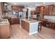 Well-equipped kitchen with ample cabinetry, granite counters, and stainless steel appliances at 6588 S Sheridan Loop, Littleton, CO 80123