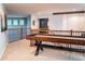 Game room with shuffleboard table and upper-level view at 6588 S Sheridan Loop, Littleton, CO 80123