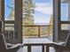Relaxing deck view showcasing the scenic mountain landscape, offering a serene escape at 26886 Evergreen Springs Rd, Evergreen, CO 80439