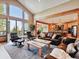 Open-concept living room with access to the deck, perfect for entertaining and enjoying the outdoors at 26886 Evergreen Springs Rd, Evergreen, CO 80439