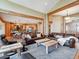 Bright living room seamlessly connected to the kitchen, creating a welcoming gathering space at 26886 Evergreen Springs Rd, Evergreen, CO 80439