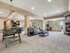 Large living room features a fireplace, windows with views and an open floorplan at 26886 Evergreen Springs Rd, Evergreen, CO 80439
