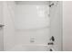 Shower/tub combo bathroom with tiled walls at 487 Interlocken Blvd # 304, Broomfield, CO 80021