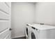 Laundry room with washer and dryer included at 487 Interlocken Blvd # 304, Broomfield, CO 80021