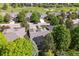 Aerial view of neighborhood homes and golf course community at 1026 Deer Clover Way, Castle Pines, CO 80108