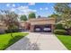 Lovely home with a spacious driveway leading to a two-car garage, ideal for car enthusiasts at 1026 Deer Clover Way, Castle Pines, CO 80108