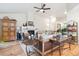 Cozy living room with hardwood floors, fireplace, and comfortable seating at 1026 Deer Clover Way, Castle Pines, CO 80108