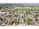 Neighborhood aerial view of the community showcases the surrounding homes, and location close to Denver at 3550 Eudora St, Denver, CO 80207