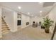 Spacious finished basement featuring recessed lighting, neutral carpet, a fireplace, and space for seating and entertainment at 3550 Eudora St, Denver, CO 80207