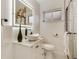 Stylish bathroom with a vessel sink, illuminated mirror, and subway tile shower with modern fixtures at 3550 Eudora St, Denver, CO 80207