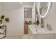 Bright remodeled basement bathroom with stylish vanity, vessel sink and open doorway, with easy access to finished basement at 3550 Eudora St, Denver, CO 80207