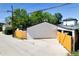 Exterior view of a detached two-car garage and private driveway at 3550 Eudora St, Denver, CO 80207