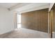 Bedroom with textured wall and large window at 1433 N Williams St # 801, Denver, CO 80218