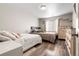 Charming bedroom with two beds, wood floors, and lots of natural light at 724 Ursula St, Aurora, CO 80011