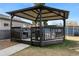 Beautiful gazebo provides a comfortable outdoor space for relaxation and entertainment at 724 Ursula St, Aurora, CO 80011