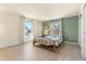 Bright bedroom with two large windows and neutral paint at 3970 S Syracuse Way, Denver, CO 80237