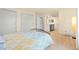 Comfortable bedroom includes spacious closets and an ensuite bathroom at 3970 S Syracuse Way, Denver, CO 80237