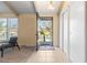 Bright foyer with tile flooring, closet, and an open view to the neighborhood at 3970 S Syracuse Way, Denver, CO 80237