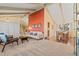 Spacious living room with access to the dining area and stairway at 3970 S Syracuse Way, Denver, CO 80237