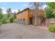 Inviting log home with stone foundation, spacious driveway, and rustic charm at 2874 Se Grapevine Rd, Idledale, CO 80453