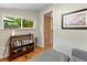 Comfortable living room with hardwood floors and backyard view at 2874 Se Grapevine Rd, Idledale, CO 80453