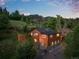 Charming log home with lush greenery and fenced yard at 2874 Se Grapevine Rd, Idledale, CO 80453