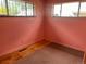 Bedroom featuring neutral walls and original hardwood floors, bathed in natural light at 3531 Forest St, Denver, CO 80207