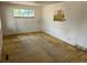 Bedroom featuring neutral walls and original floors, bathed in natural light at 3531 Forest St, Denver, CO 80207