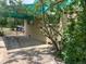 Side view of the home showing the carport and exterior brick detail at 3531 Forest St, Denver, CO 80207