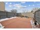 Spacious backyard patio with privacy fence, ideal for outdoor relaxation and entertaining at 4641 W Ponds Cir, Littleton, CO 80123