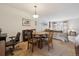 Inviting dining area with neutral tones, comfortable seating, and ample natural light at 4641 W Ponds Cir, Littleton, CO 80123