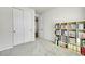Bedroom featuring carpet floors, white trim, and a large closet at 4644 Hatcher Dr, Brighton, CO 80601