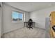 Bright bedroom with a window that provides natural light for a desk area with a modern desk chair at 4644 Hatcher Dr, Brighton, CO 80601