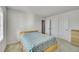 Simple bedroom with double closet and neutral decor at 4644 Hatcher Dr, Brighton, CO 80601