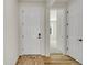 Entryway with luxury vinyl plank floors and a rug at 4644 Hatcher Dr, Brighton, CO 80601