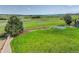 Green backyard with plenty of space and a trampoline, perfect for outdoor activities at 6078 Bridle Path Ln, Parker, CO 80134